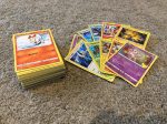 100 Pokemon Cards including 10 Holo Cards For Sale